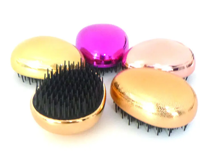 Mini Uibheacha Múnla Taistil Detangling Gruaige Scuab